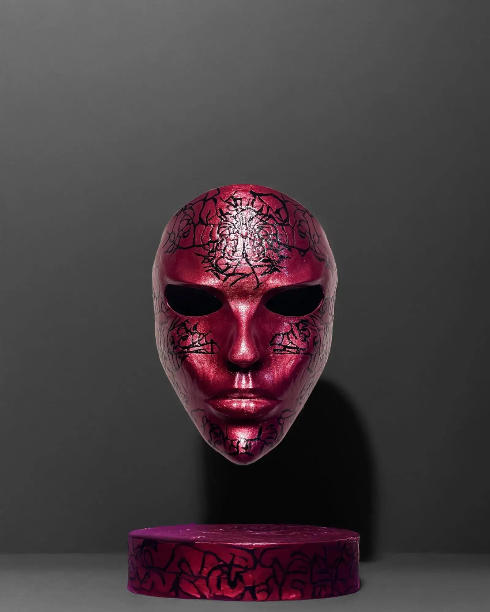 Abstract Crackle look black pattern; Handmade Red Masquerade Mask with handcrafted venetian design for cosplay and fantasy themes.