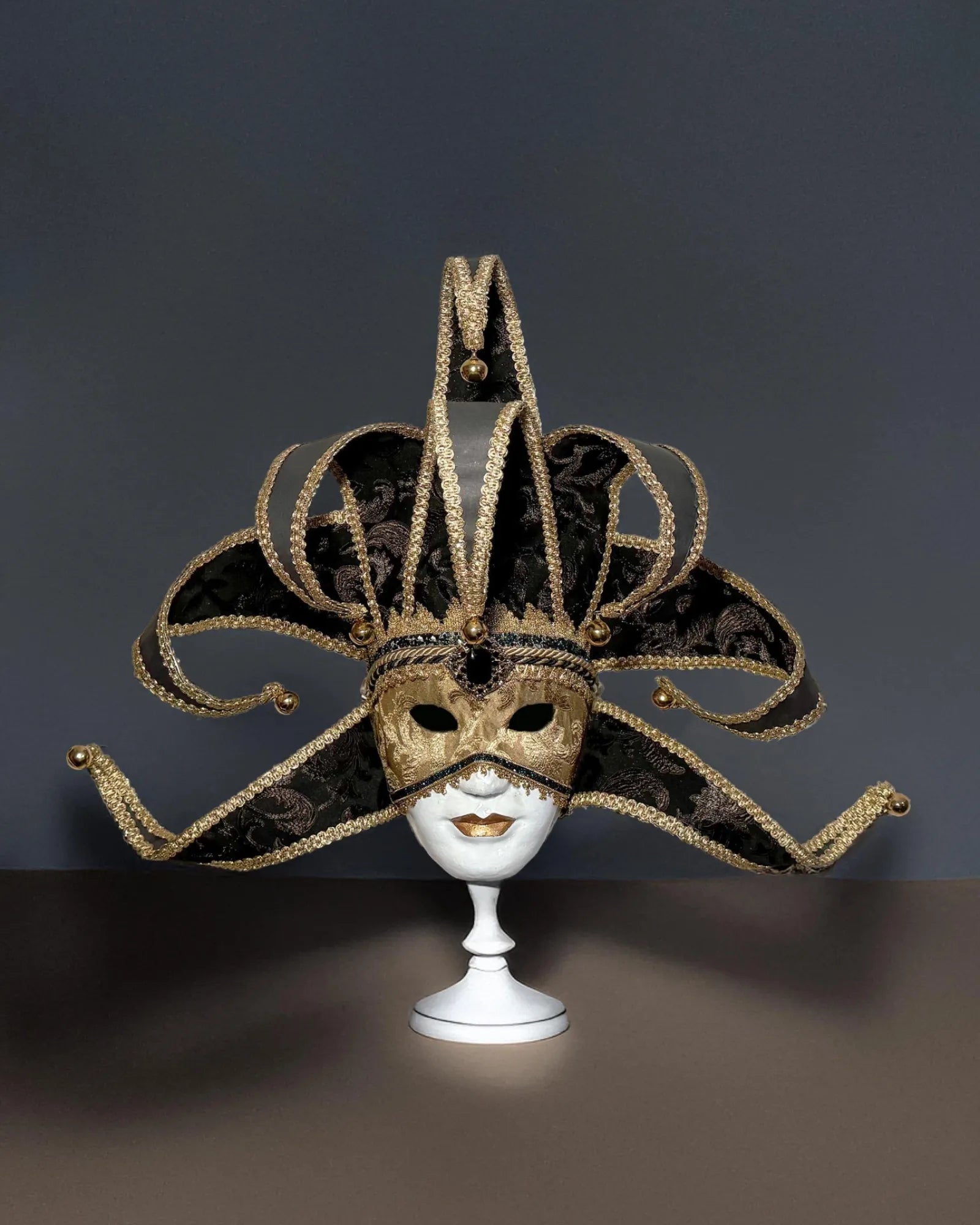 Black and Gold Luxury Jester, Venetian; Luxurious Fabric Mask, handcrafted for cosplay, masquerade events.