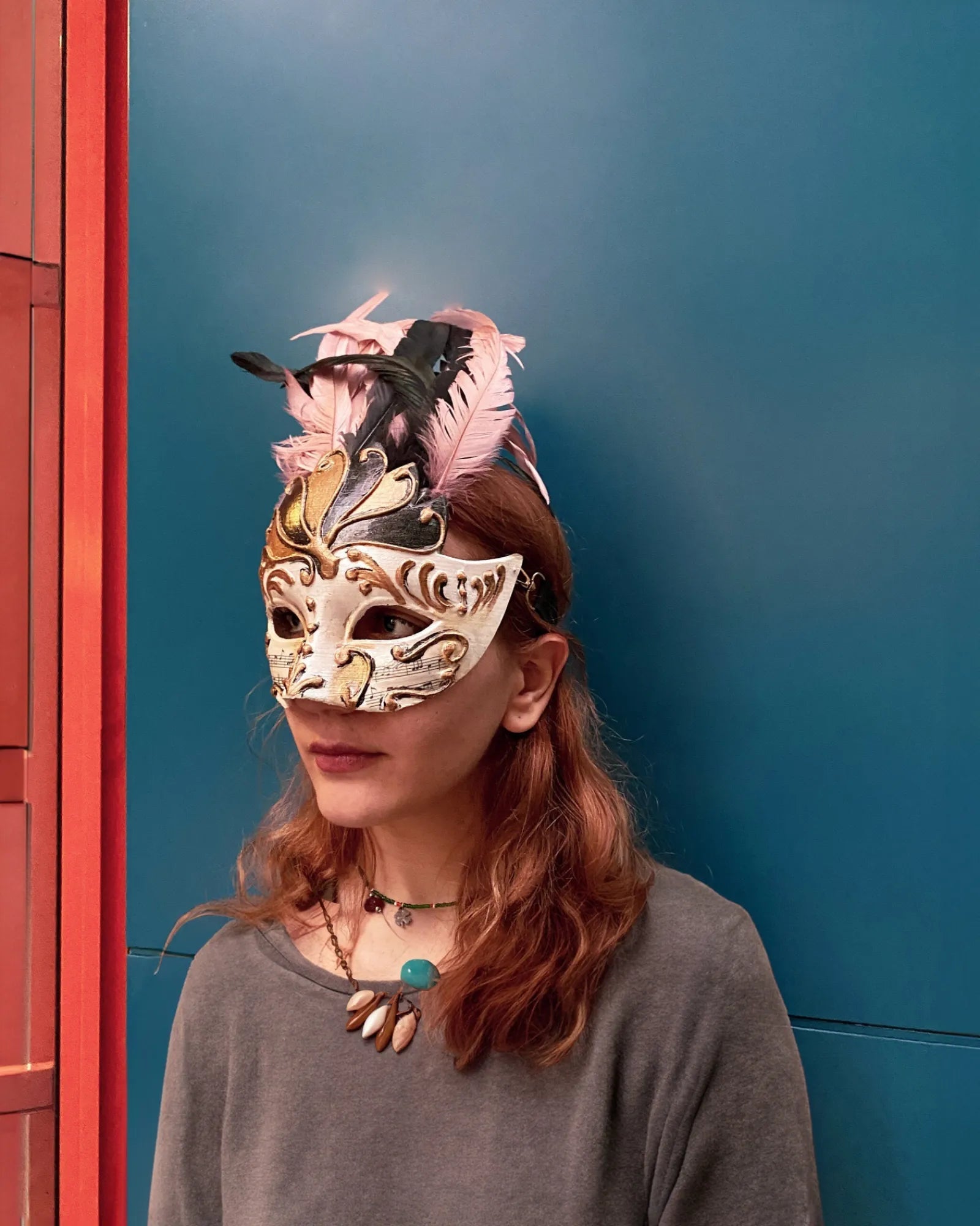 Chic Winged Crown Venetian; Delicate Powder Pink with Black Feathers mask, handcrafted, perfect for masquerade and cosplay events.