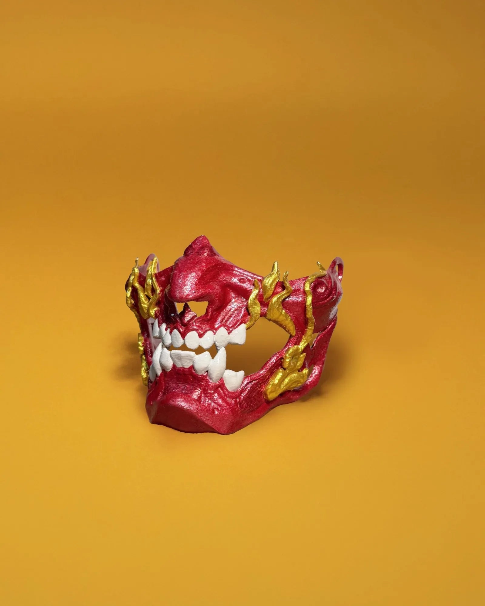 Fire Red Gold Samurai Demon Oni; red Oni demons mask with gold teeth, handcrafted Venetian cosplay mask for fantasy events.