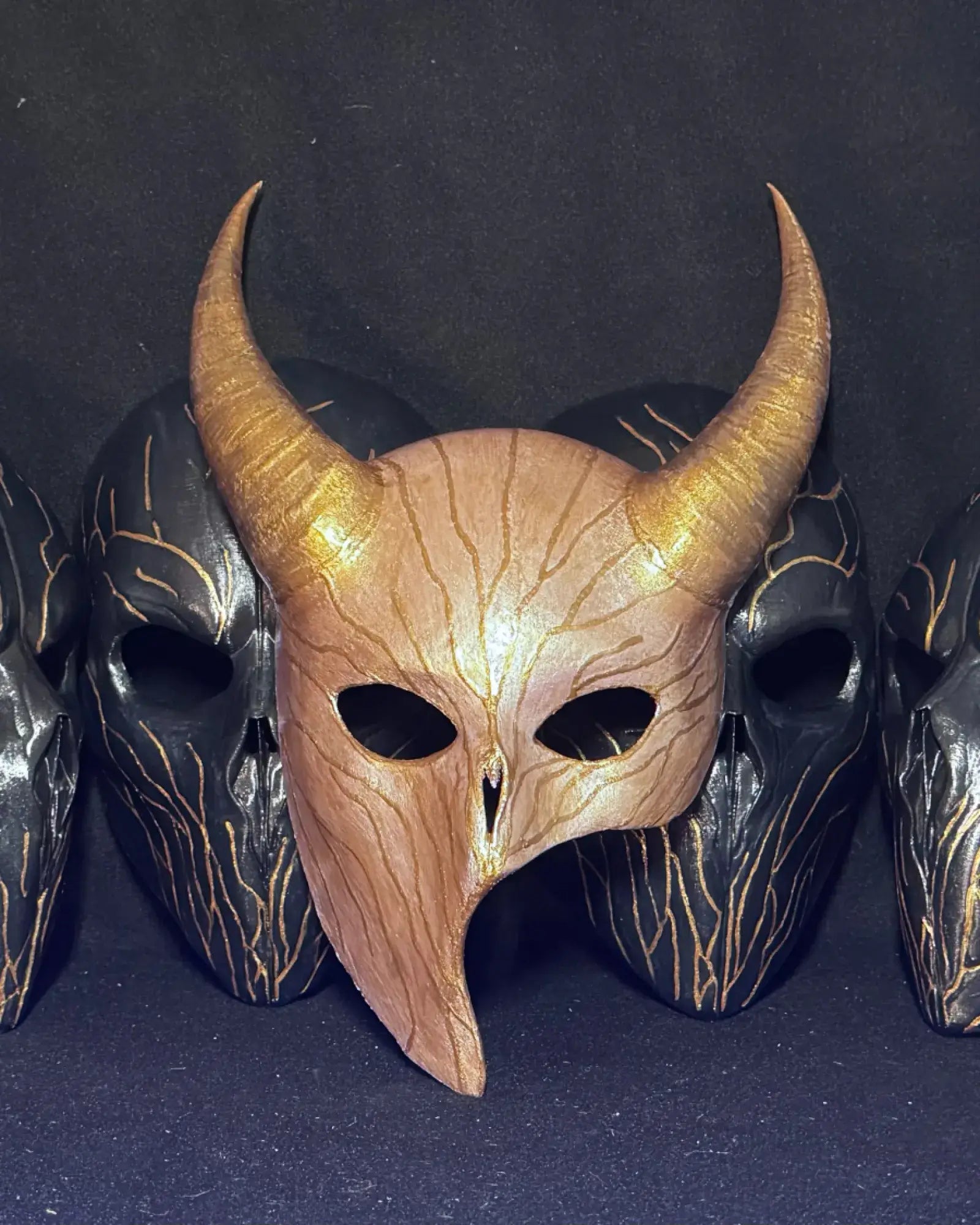 Mehrshab Custom Production masks showcasing a handcrafted venetian mask with horns, perfect for cosplay and fantasy enthusiasts.