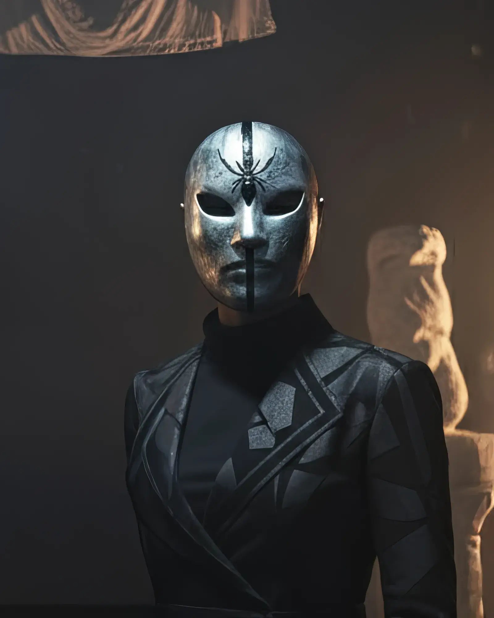 Silver Spider Mask with Black Stripe & Spider; Unique Cosplay Prop mask worn by a model, showcasing handcrafted Venetian design.