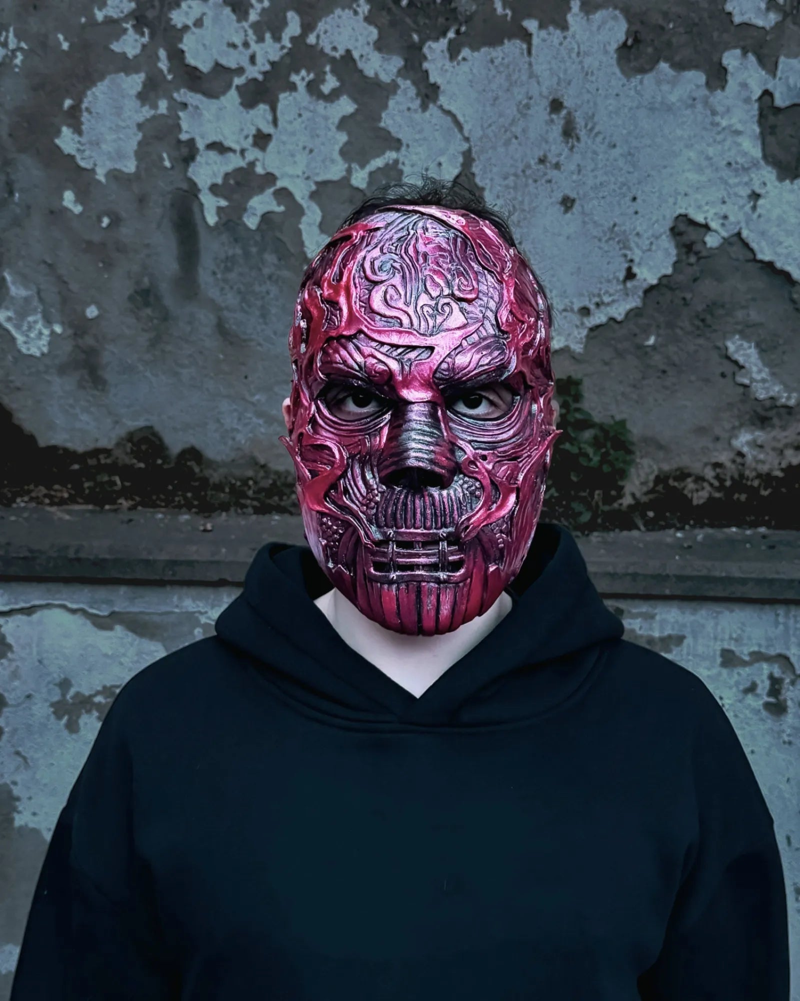 Slipknot Alessandro Venturella "Vman"; Red and Black Metal Music mask handcrafted Venetian cosplay accessory, front view.