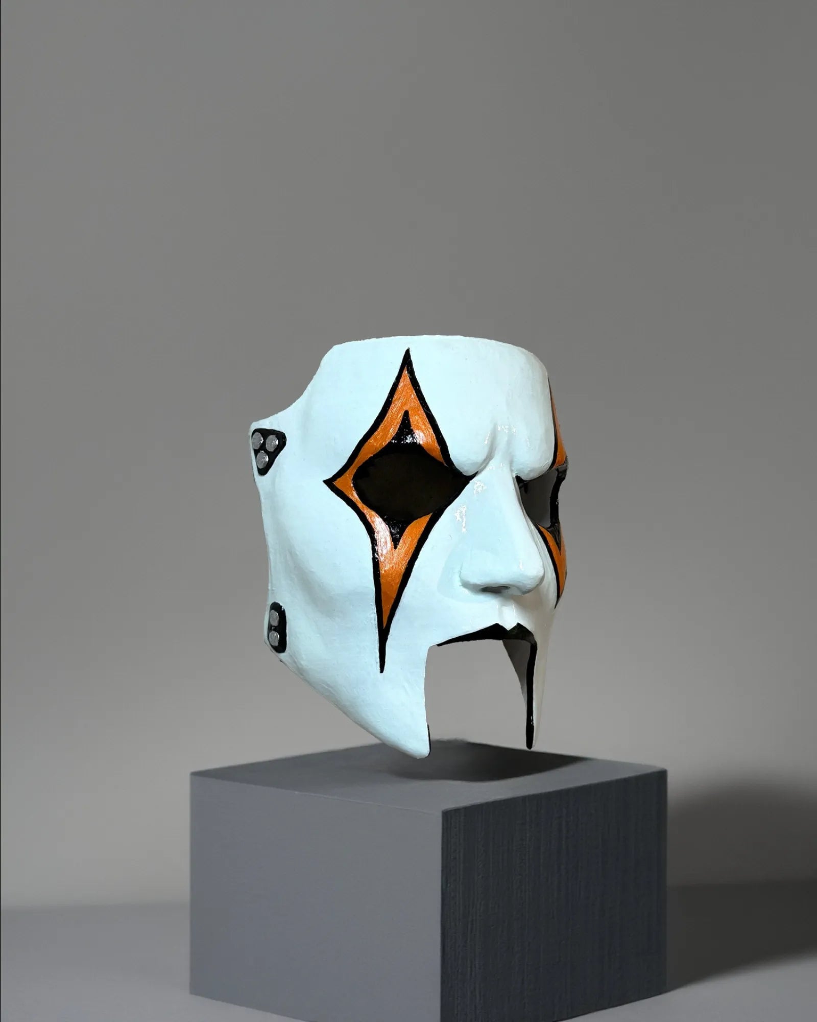 Slipknot Jim James Root; New Design, Orange and Black Detail Metal Music mask, handcrafted Venetian cosplay fantasy mask on display