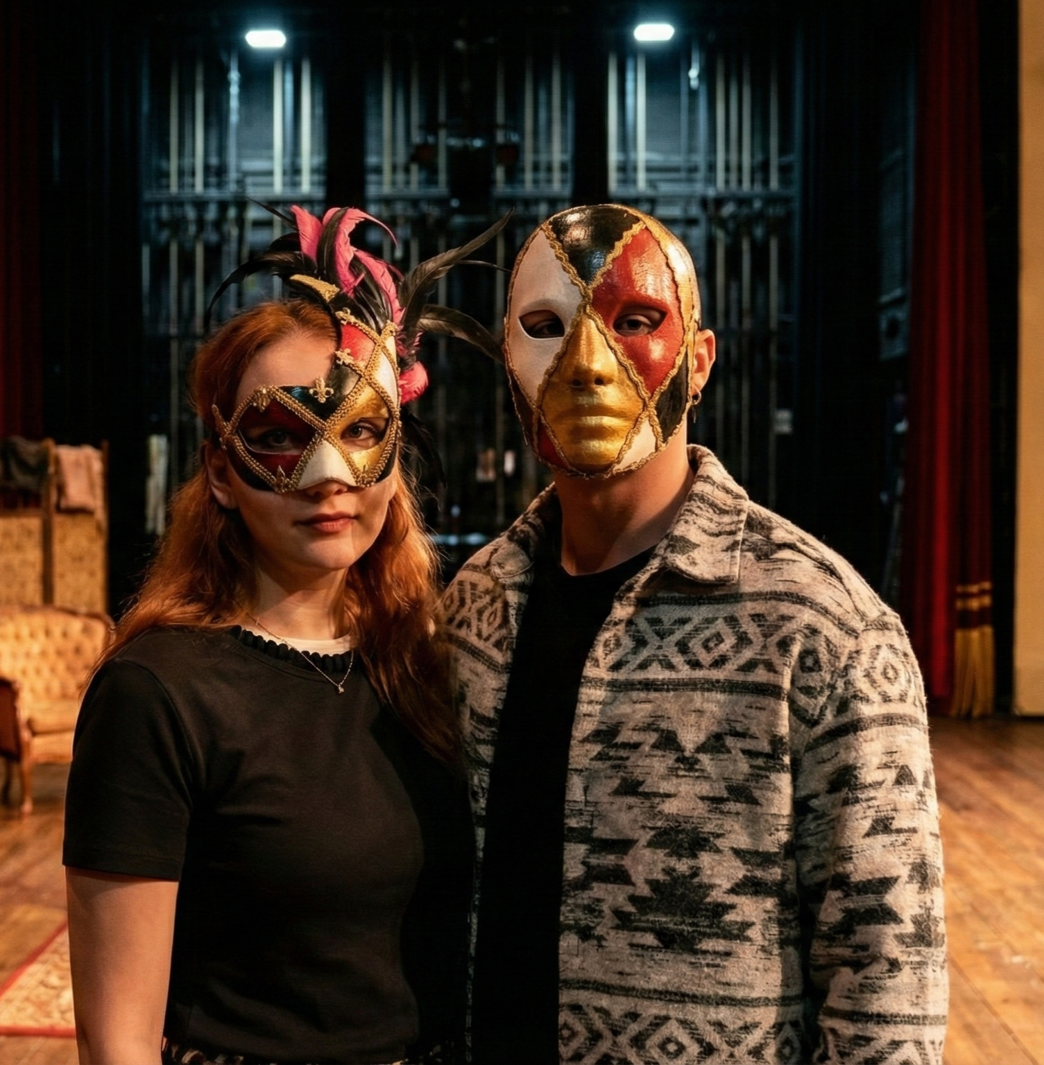 Two people wearing Harlequin Venetian masks on stage, perfect for handcrafted fantasy cosplay events.