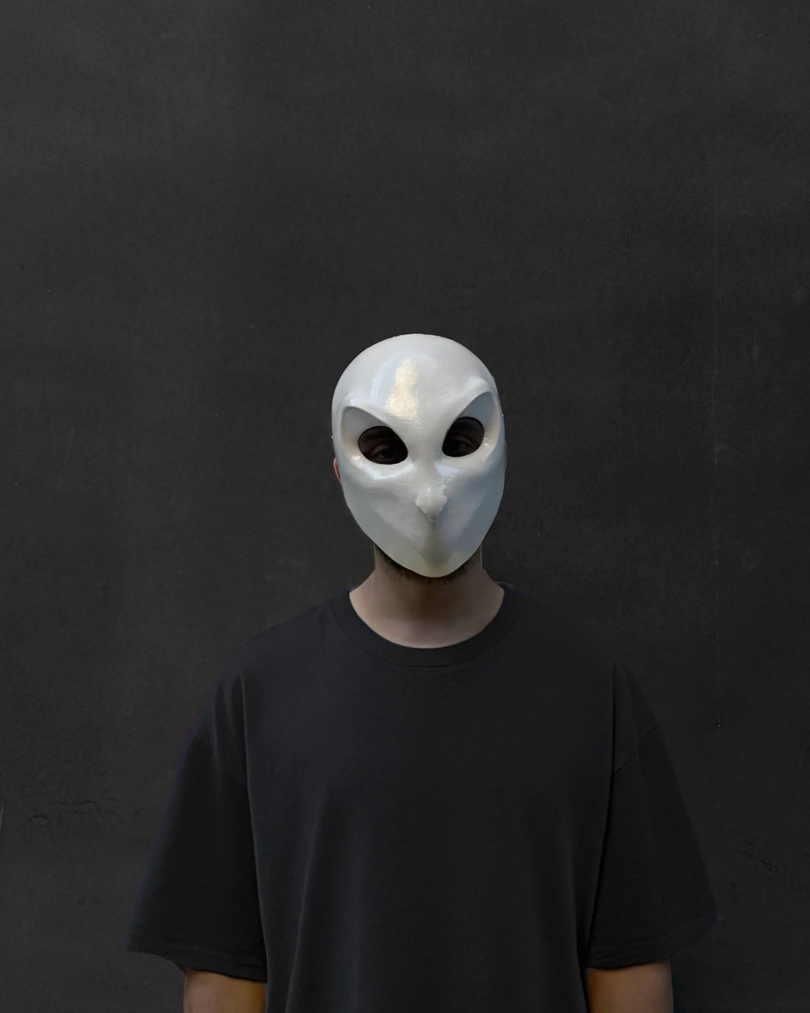 Person wearing "Court of Owls; Iconic Villain Face Handcrafted Cosplay Mask," a Venetian handcrafted mask perfect for cosplay.