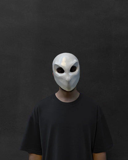 Person wearing "Court of Owls; Iconic Villain Face Handcrafted Cosplay Mask," a Venetian handcrafted mask perfect for cosplay.