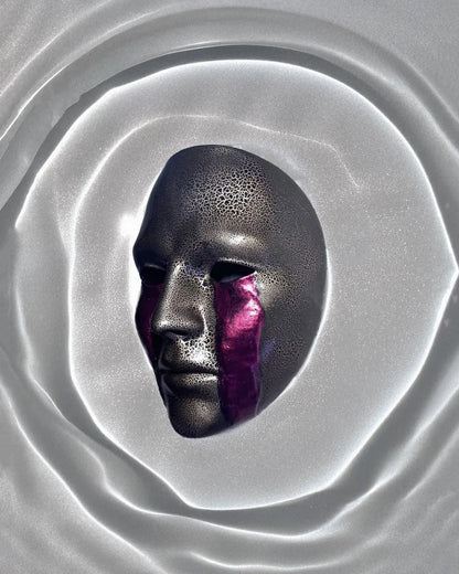 Cracked Black and Gold with Blood Cry Lines; Gothic Art Cosplay Mask displayed on reflective surface.