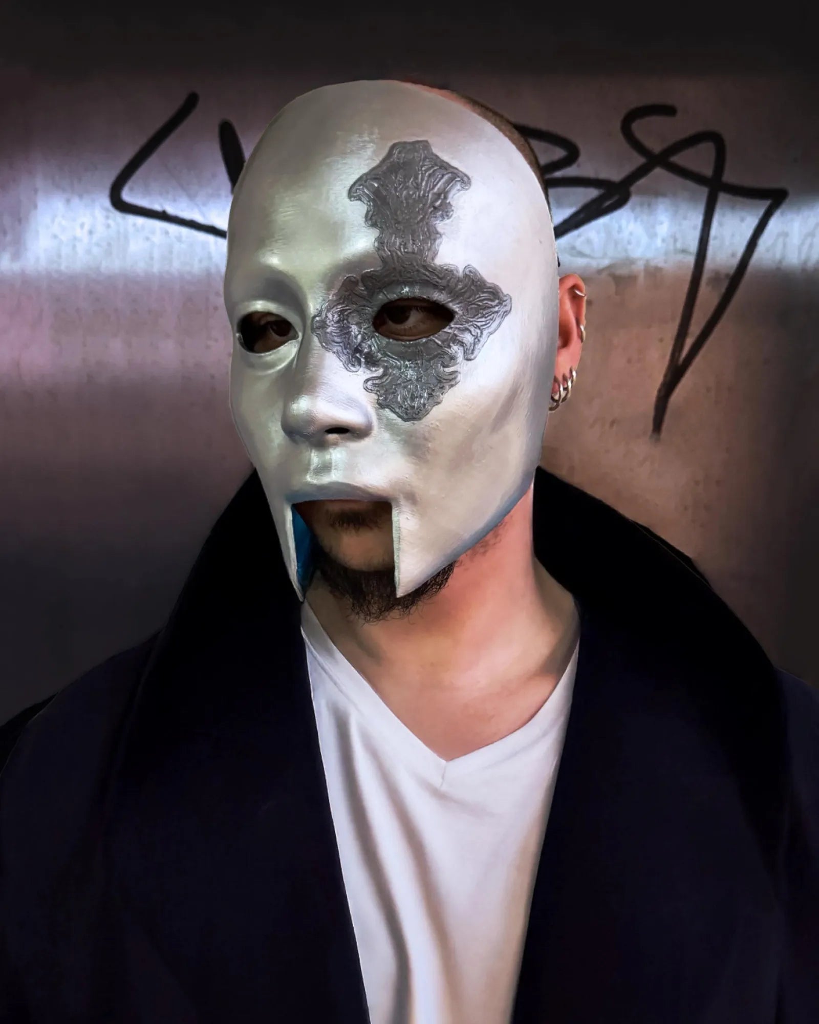 Ghost Nameless Ghouls; Ghost Perpetua Era - Silver Look Skull Mask handcrafted Venetian cosplay mask in a fantasy setting.