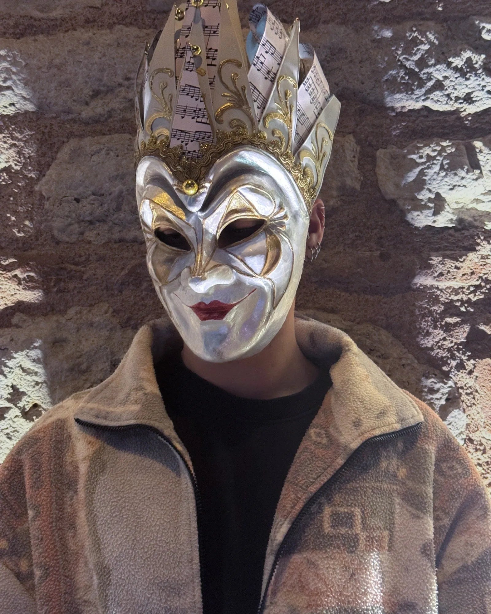 Joker Venetian Mask Unique White; Colorful Rio Carnival, Techno elegantly worn at a cosplay event with handcrafted Venetian style.