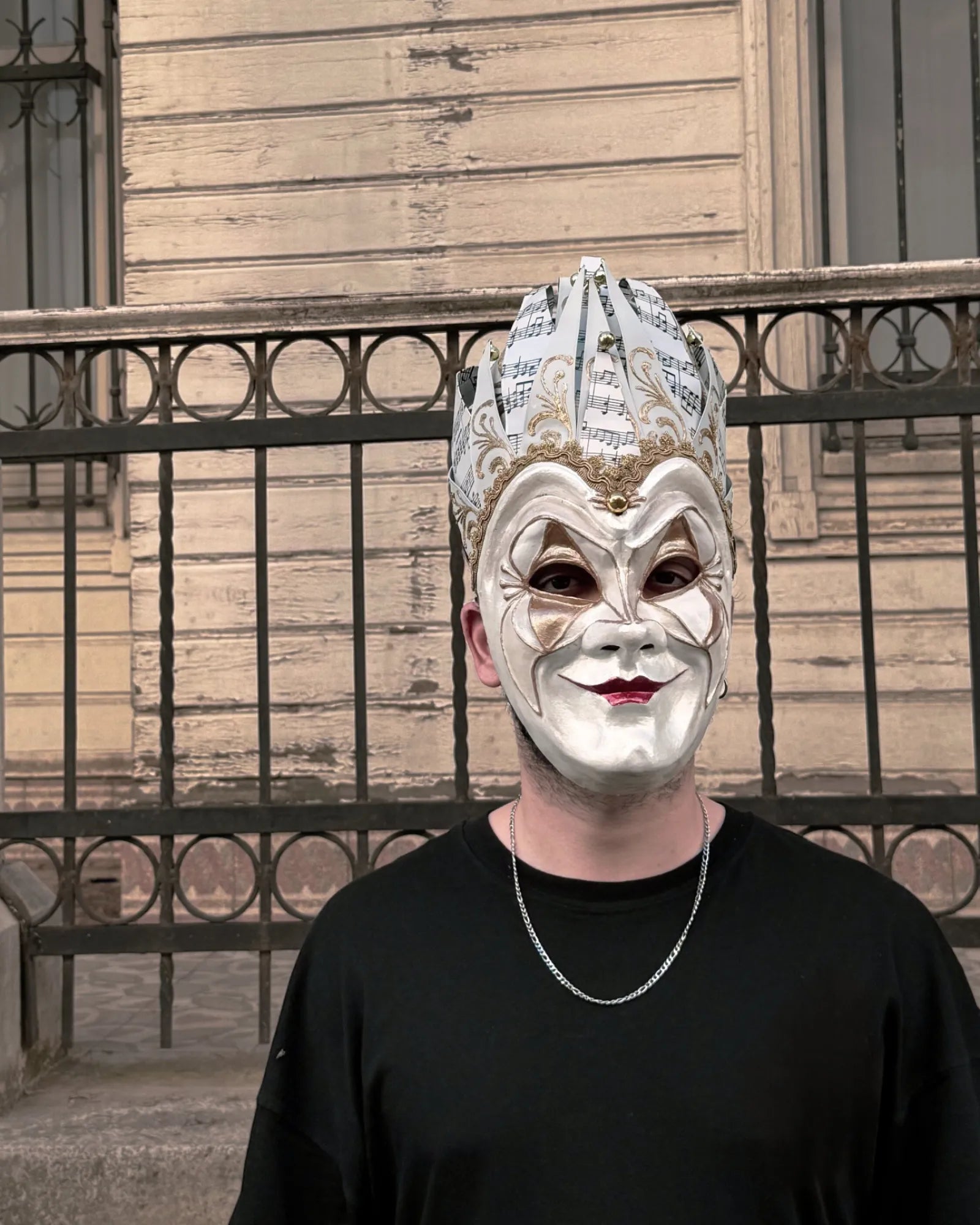 Joker Venetian Mask Unique White; Colorful Rio Carnival, Techno on person, showcasing handcrafted venetian cosplay fantasy design.