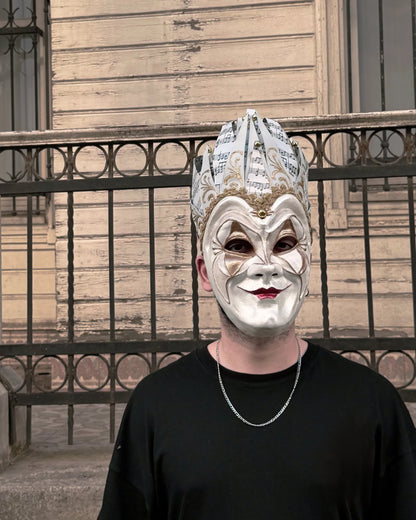 Joker Venetian Mask Unique White; Colorful Rio Carnival, Techno on person, showcasing handcrafted venetian cosplay fantasy design.