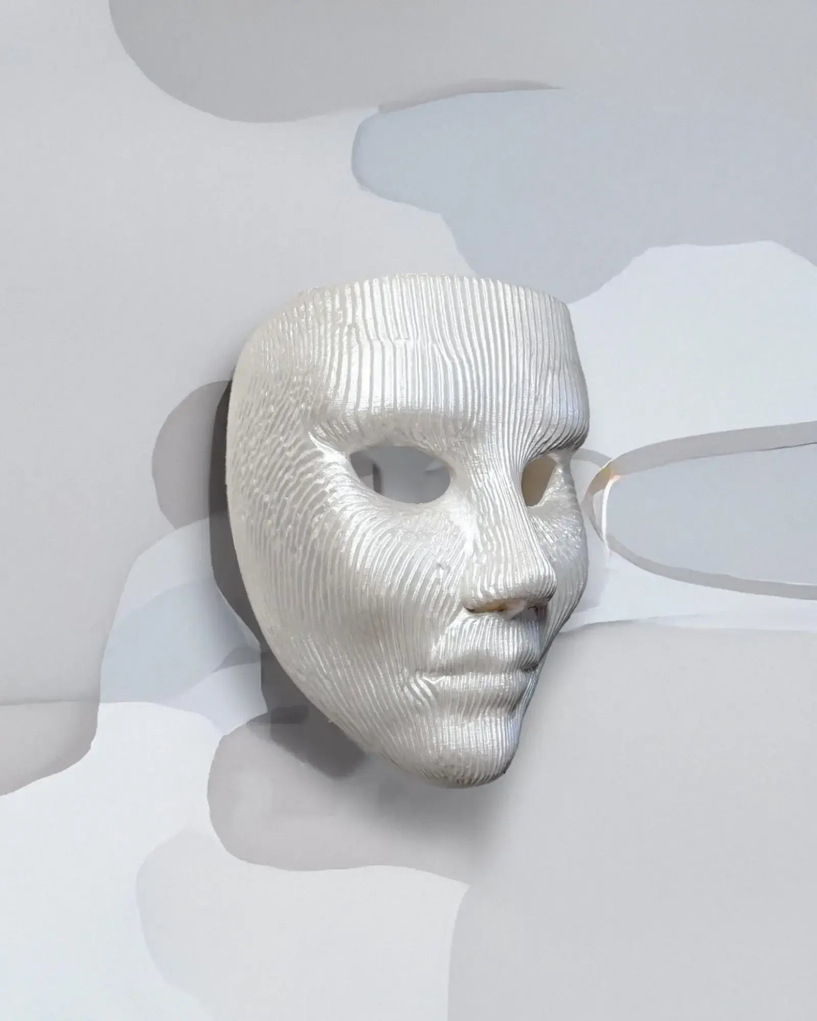 Minimalist Modern Lines; White Textured Face Sculpture, Modern Art mask displayed on a light background.