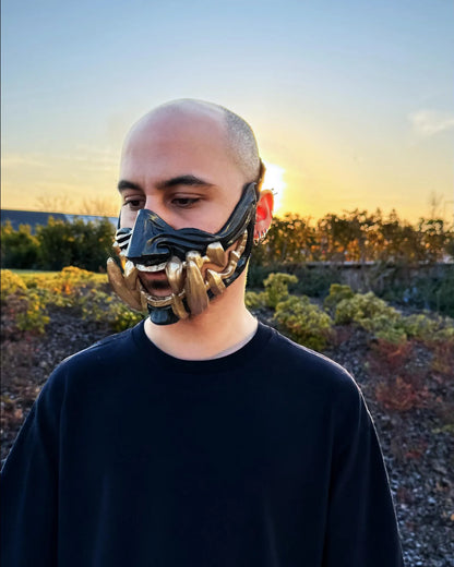 Samurai Demon Oni; Black mask with gold teeth, handcrafted Venetian cosplay mask for fantasy events.