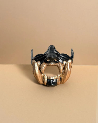 Samurai Demon Oni; Black mask with gold teeth, handcrafted venetian mask for cosplay and fantasy events.