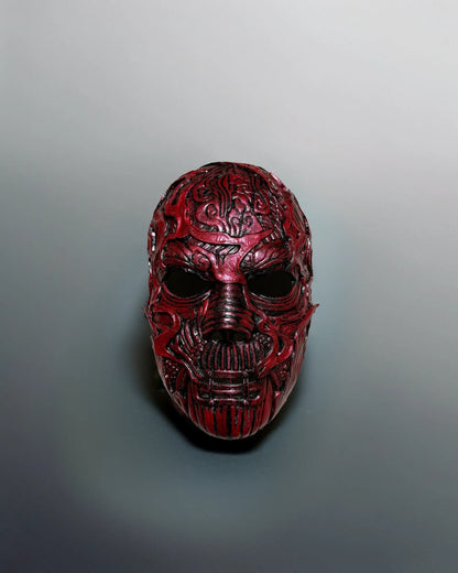 Slipknot Alessandro Venturella "Vman"; Red and Black Metal Music mask, handcrafted Venetian cosplay mask for fantasy enthusiasts.