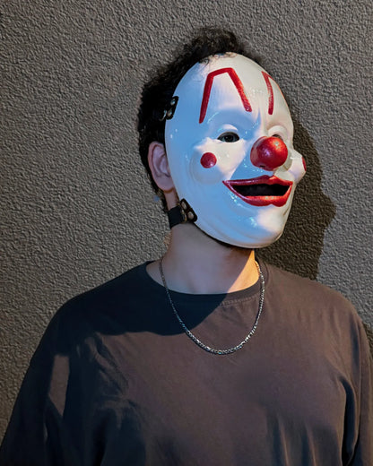 Person wearing Slipknot Shawn "Clown" Crahan; White Metal Music Band Mask, a handcrafted venetian cosplay fantasy accessory.