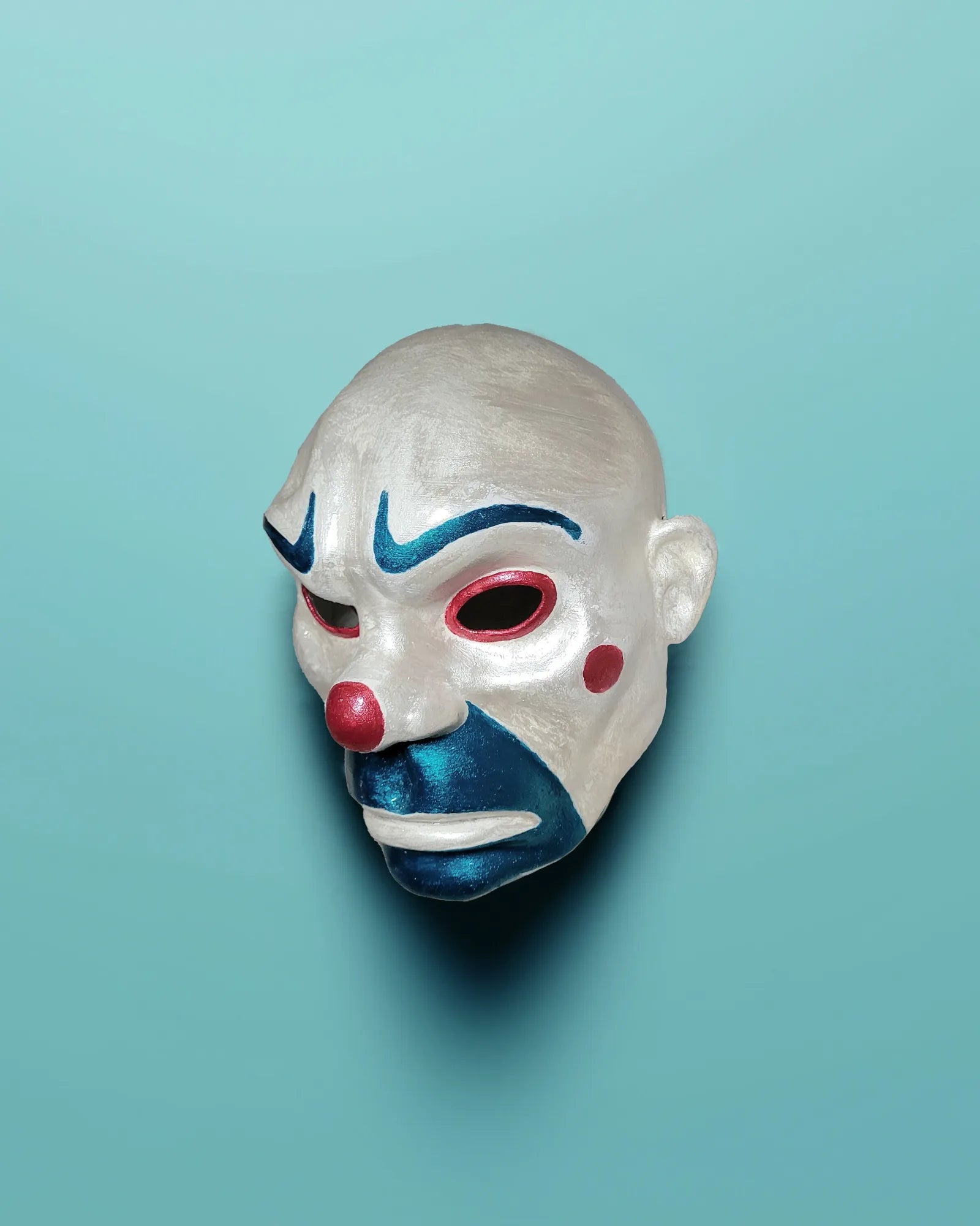 The Bozo Joker; Iconic Villain Face, Handcrafted Venetian clown mask for cosplay and masquerade parties.