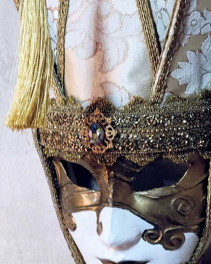 The Popess - Luxurious White and Gold Chic Art Venetian Mask for Masquerade, handcrafted in high-quality fabric with ornate details.